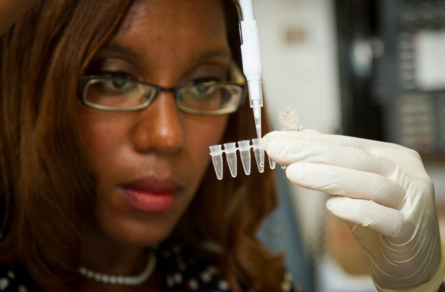 A genetic testing kit being held by a person’s hands. This image highlights the importance of personalized health solutions.