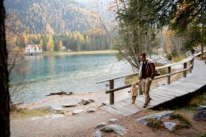 A person taking a walk in nature, finding peace while exploring the beauty of the outdoors.