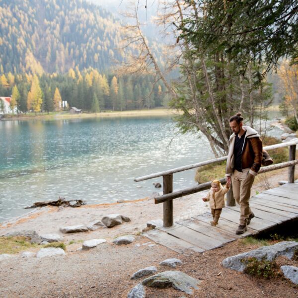 A person taking a walk in nature, finding peace while exploring the beauty of the outdoors.